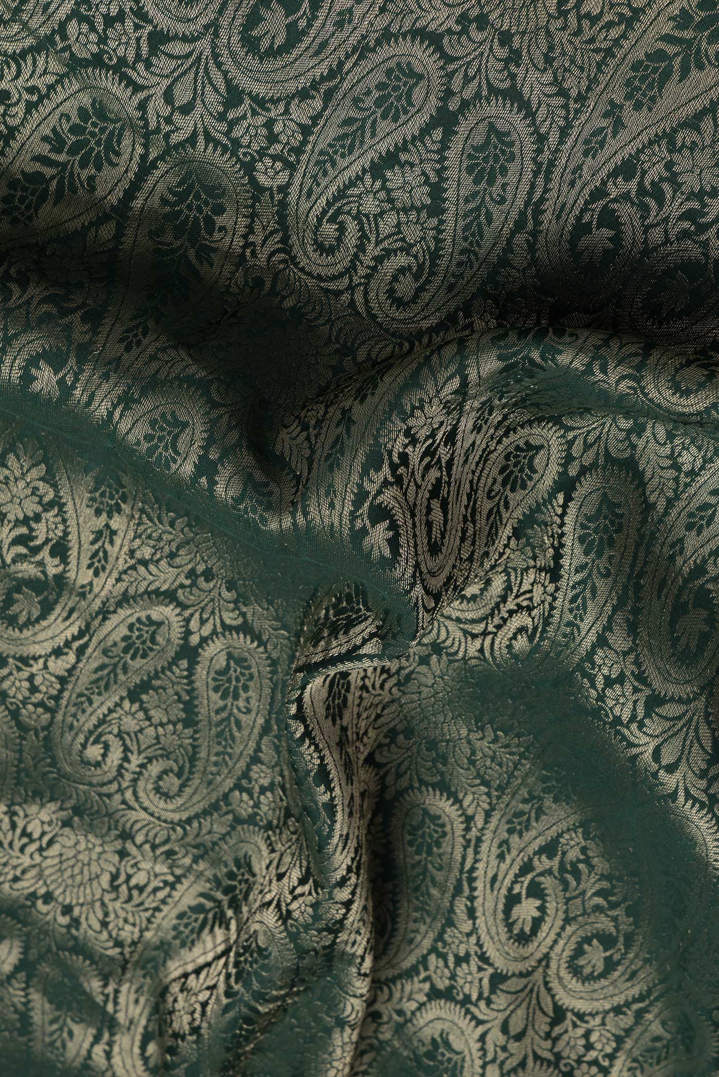 Close up of Bottle Green Dual Tone Mysore Silk Saree with Zari Brocade on the body and Zari Border.  displaying folds
