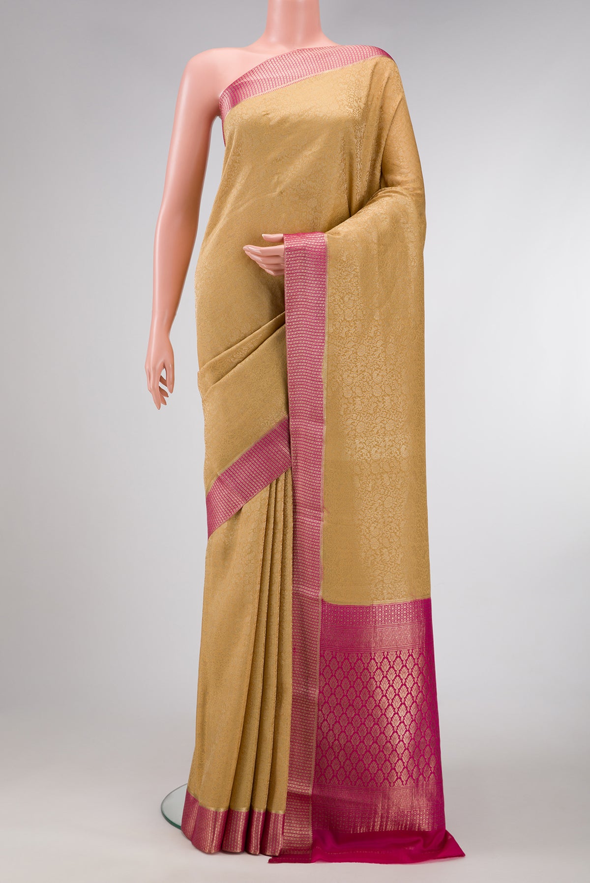Sandal Dual Tone Mysore Silk Saree with Zari Brocade on the body and Zari Border.  displayed on a mannequin