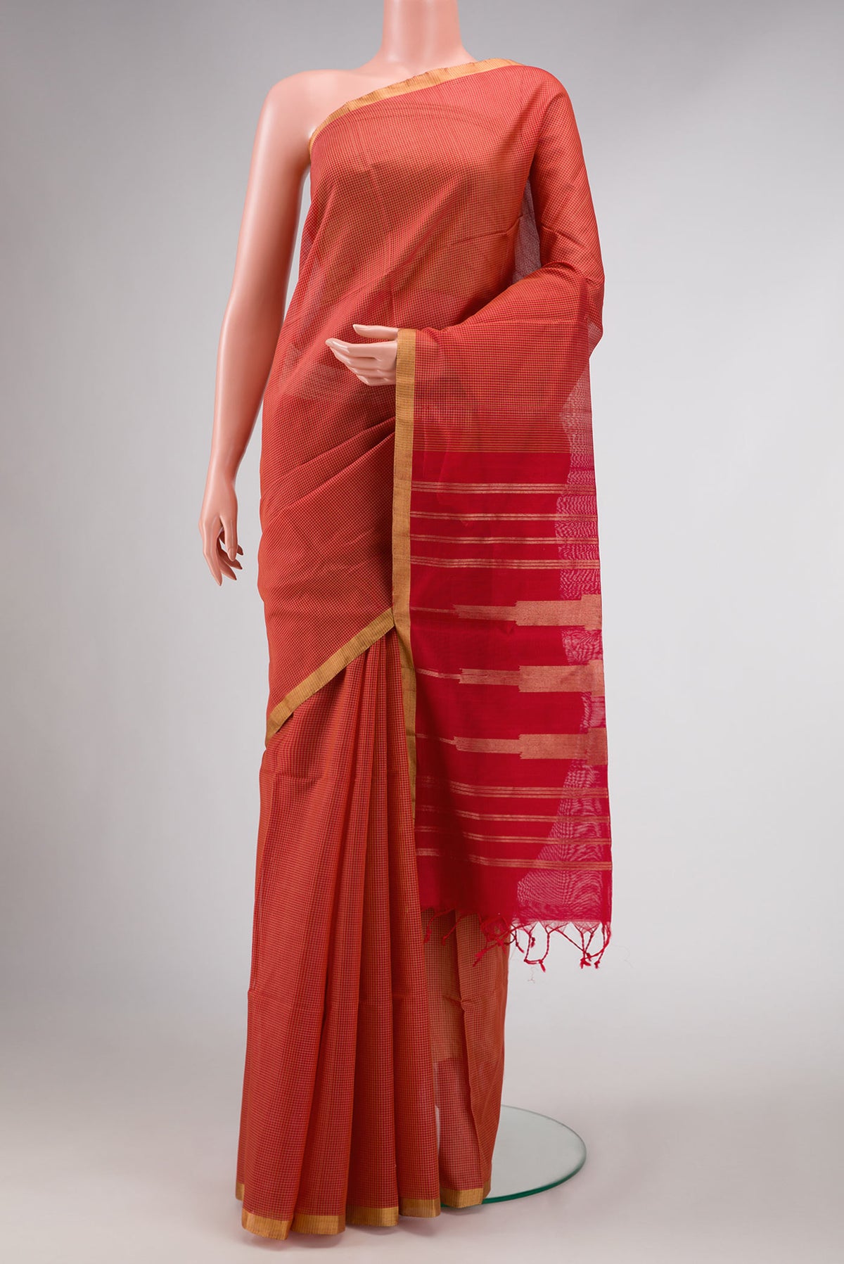 Red Dual Tone Silk Cotton Saree with Checked design on the body and Zari Border displayed on a mannequin