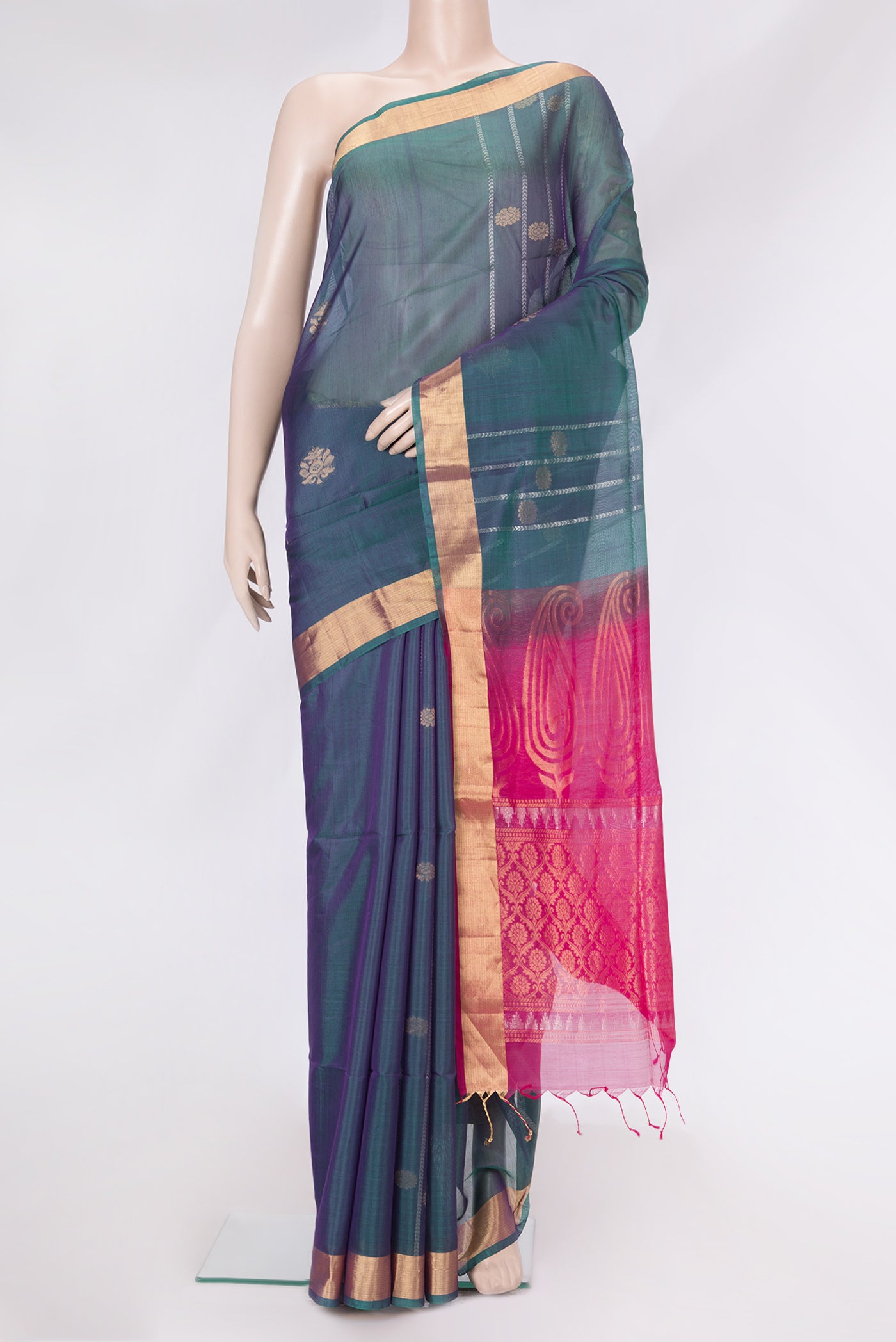 Peacock Blue Dual Tone Silk Cotton Saree with Zari Butta on the body and Zari Border.  displayed on a mannequin