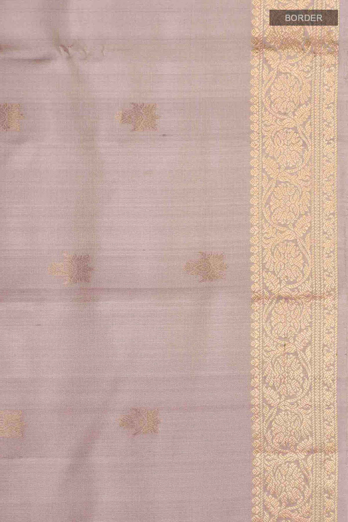 Border image of Grey Soft Silk Saree with Zari Butta on the body and Zari Border