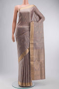 Grey Soft Silk Saree with Zari Butta on the body and Zari Border displayed on a mannequin