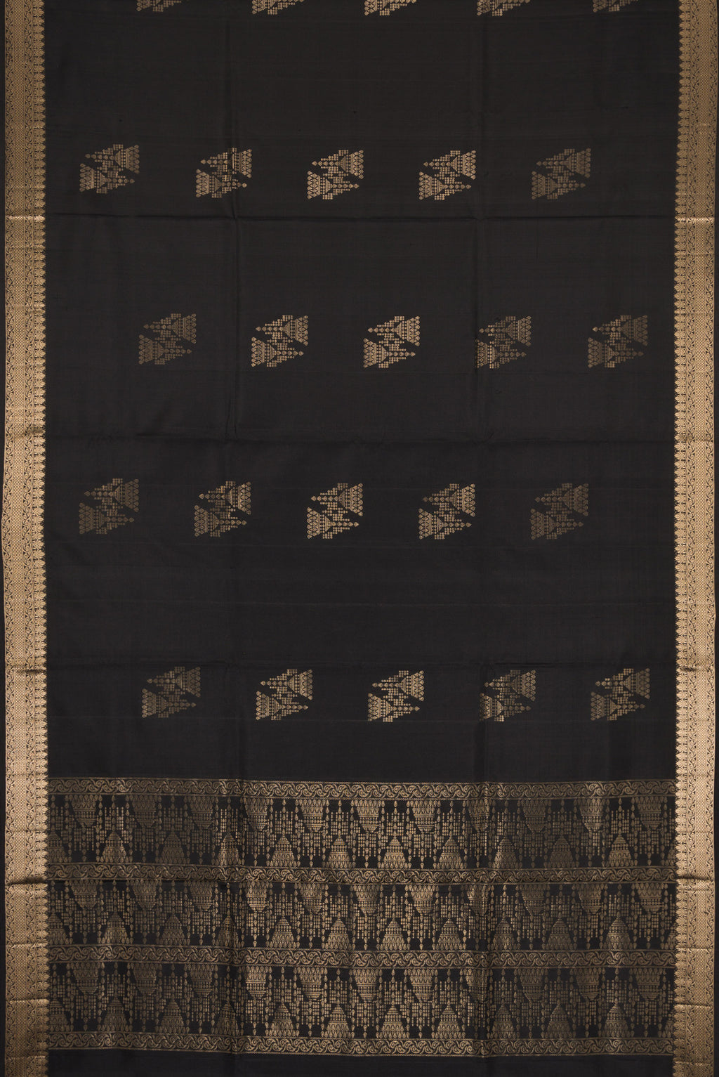 Flat view of Black Dual Tone Soft Silk Saree with Zari Butta on the body and Zari Border. 