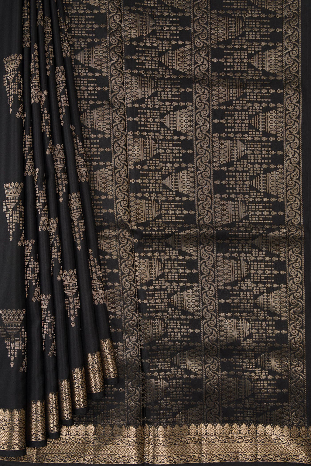 Pleats and pallu of Black Dual Tone Soft Silk Saree with Zari Butta on the body and Zari Border. 