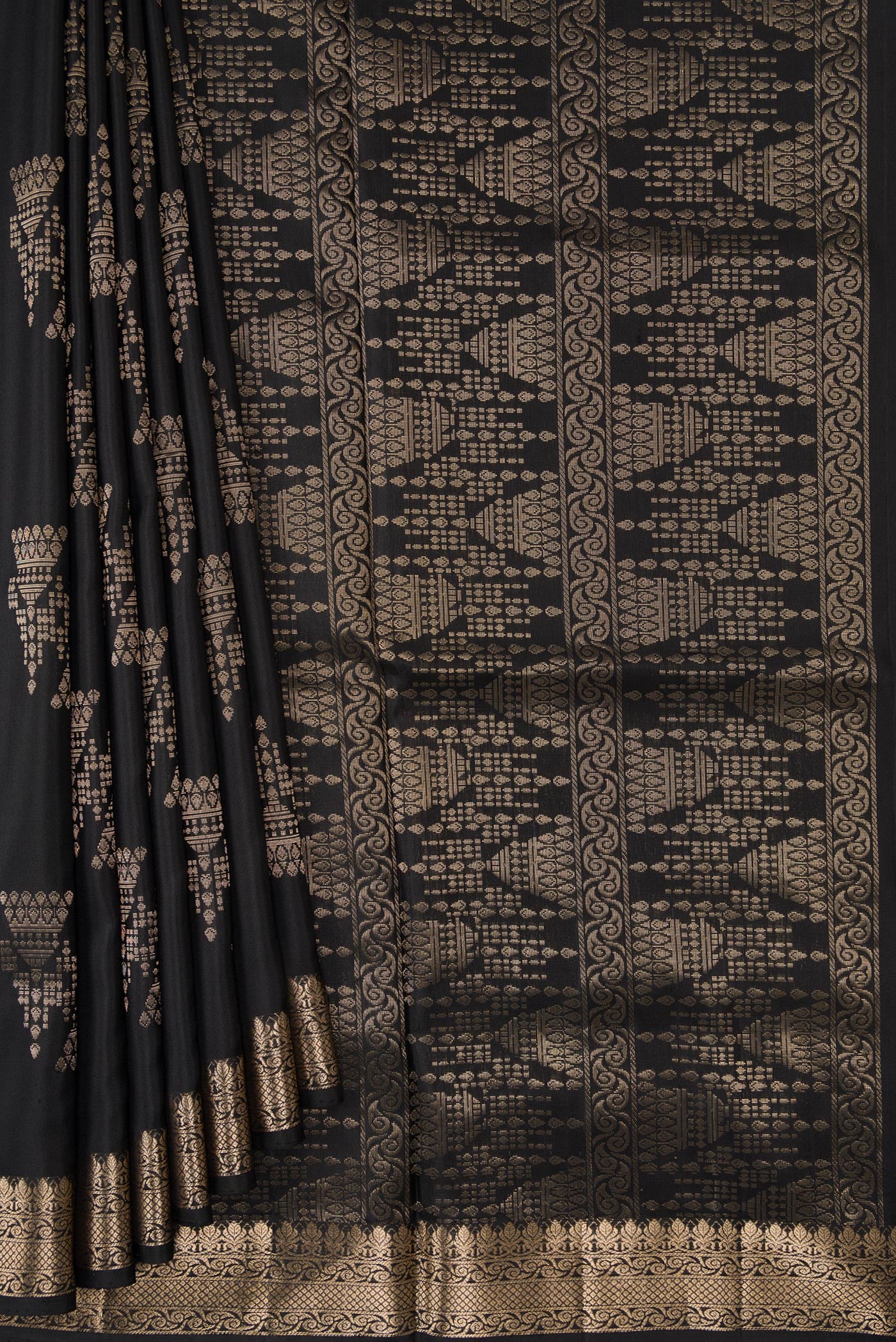 Pleats and pallu of Black Dual Tone Soft Silk Saree with Zari Butta on the body and Zari Border. 