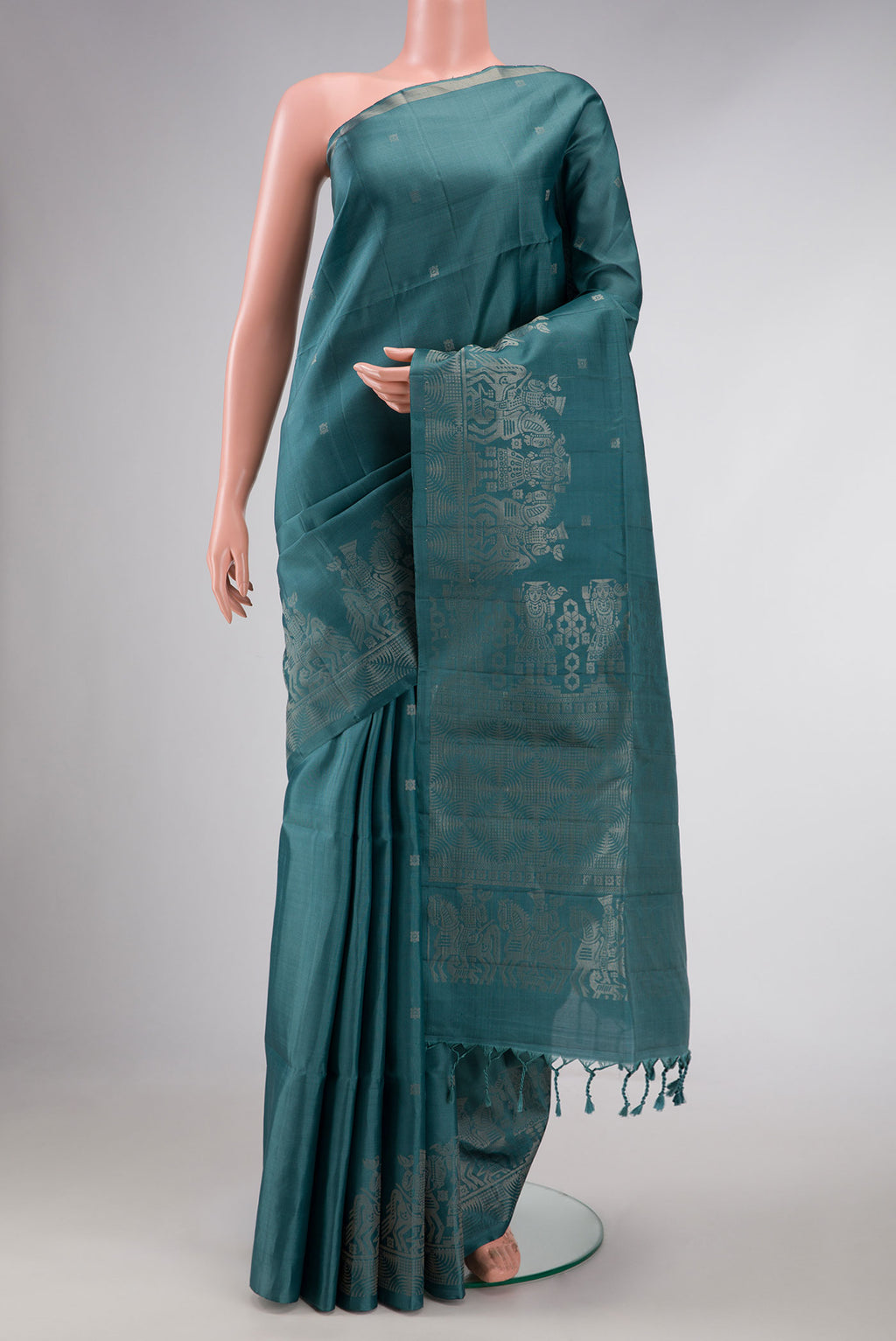 Maya Blue Dual Tone Soft Silk Saree with Zari Butta on the body and Without Border displayed on a mannequin