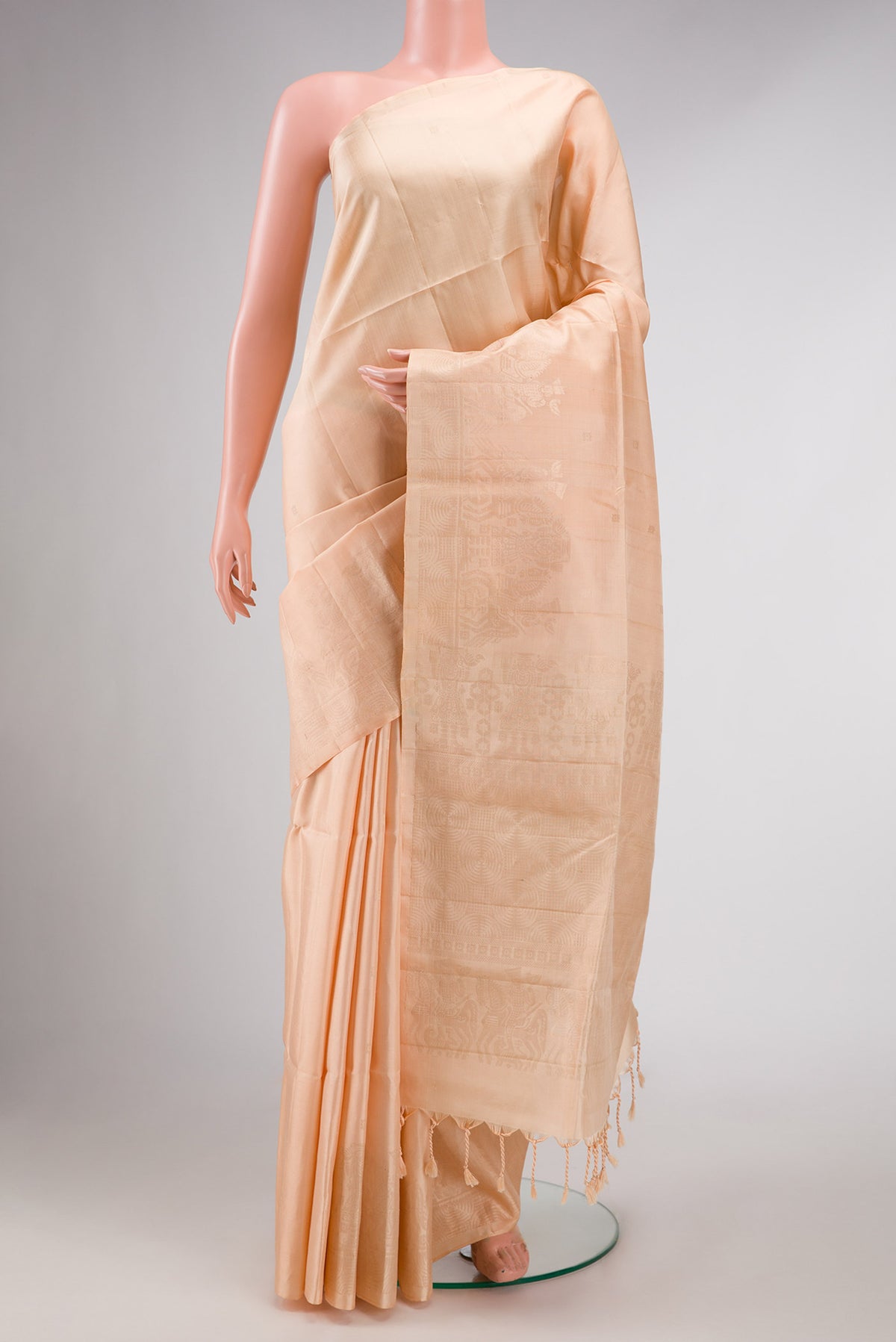 Sandal Dual Tone Soft Silk Saree with Zari Butta on the body and Fancy Border displayed on a mannequin
