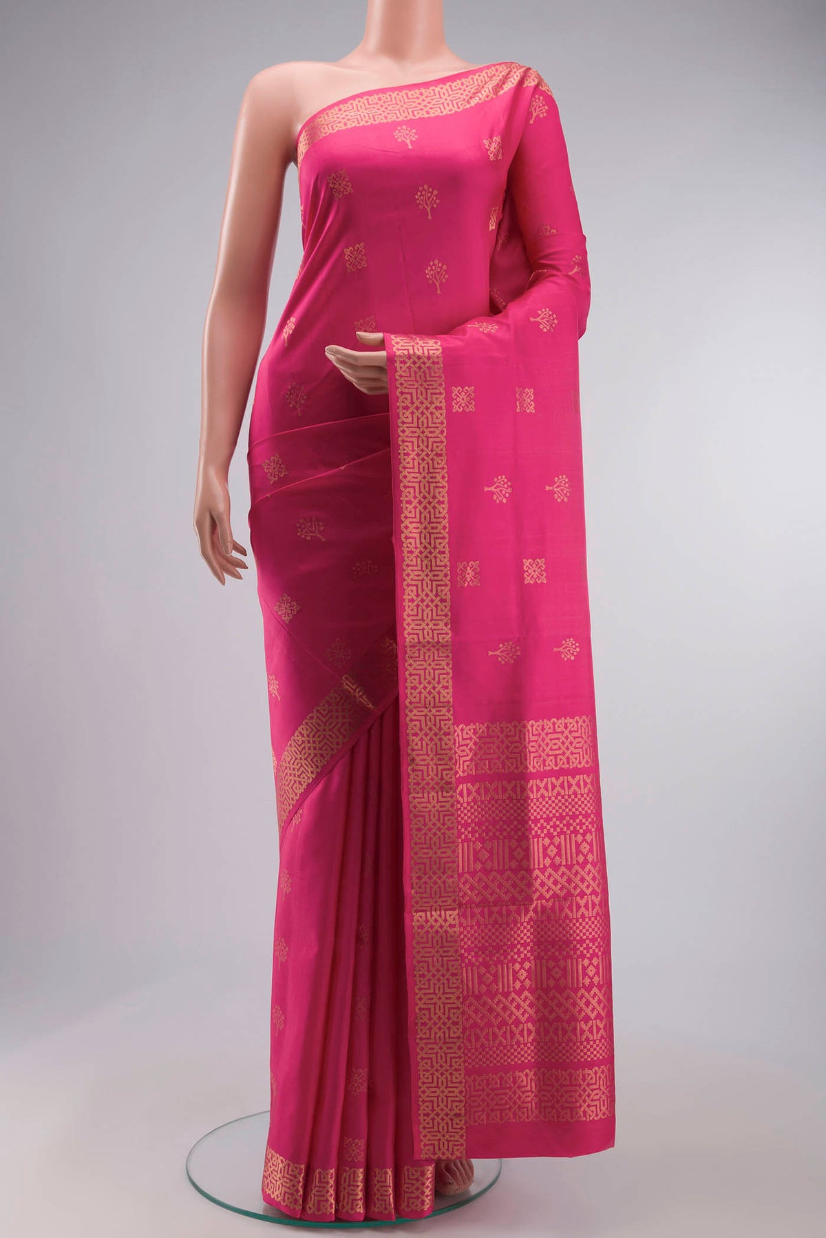 Pink Soft Silk Saree with Zari Butta on the body and Zari Border displayed on a mannequin