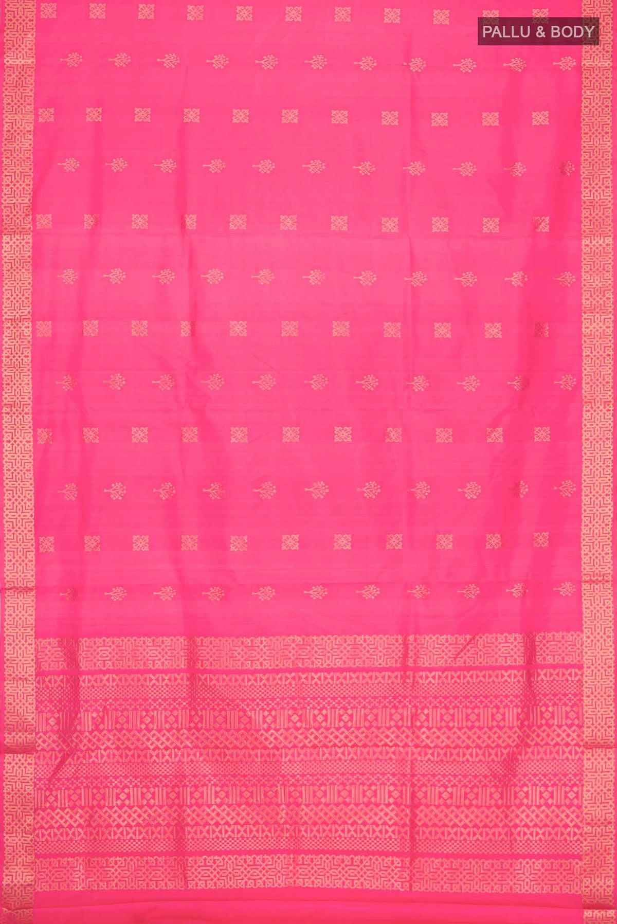 Flat view of Pink Soft Silk Saree with Zari Butta on the body and Zari Border