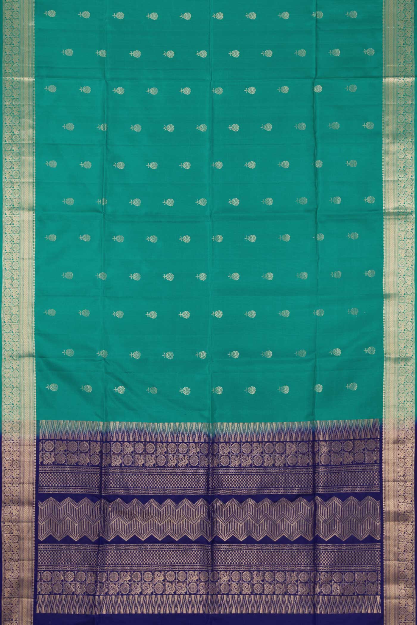 Flat view of Green Dual Tone Soft Silk Saree with Zari Butta on the body and Zari Border. 