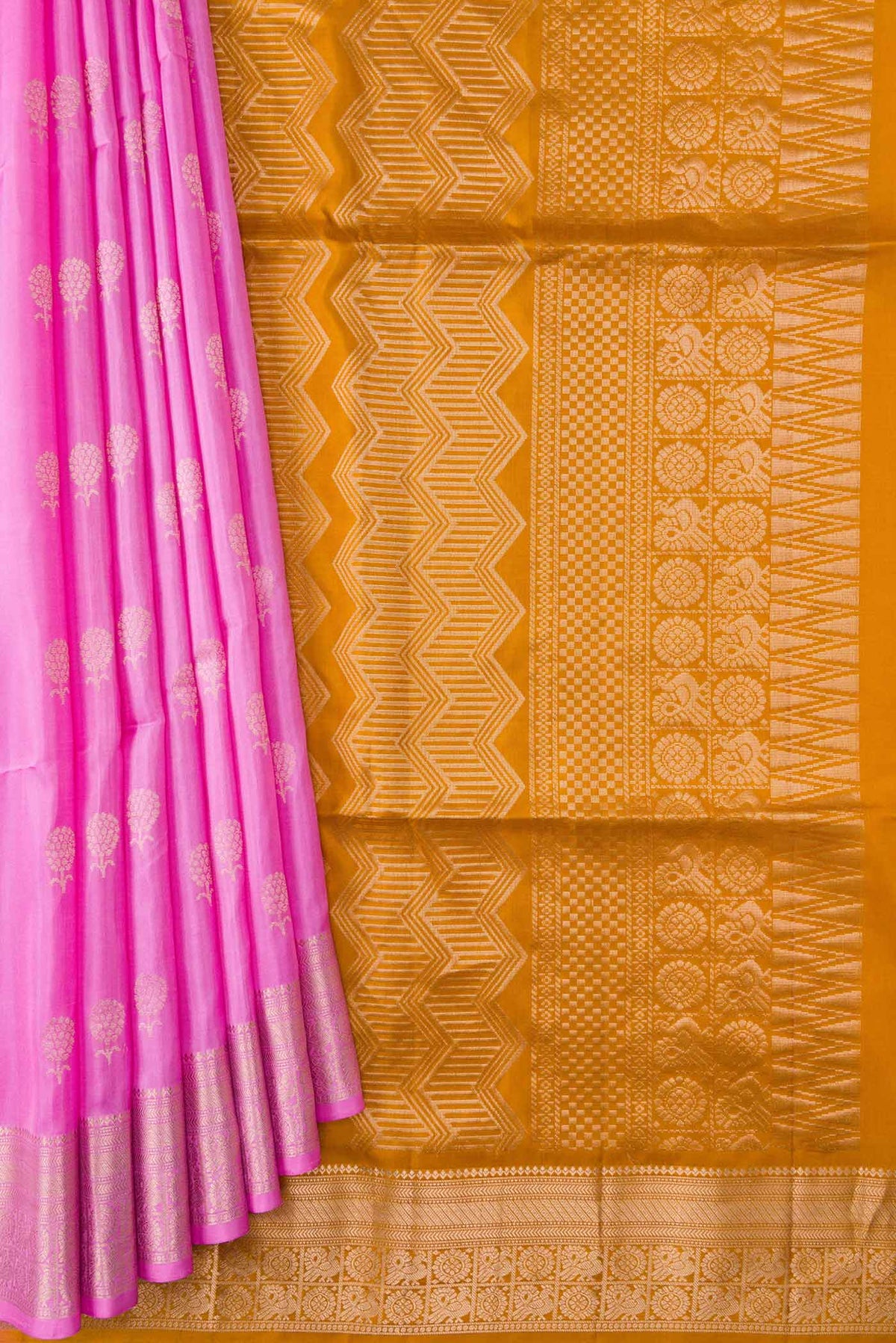 Pleats and pallu of Rose pink Soft Silk Saree with Zari Butta on the body and Zari Border