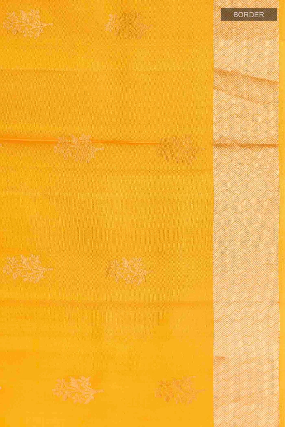 Border image of Yellow Soft Silk Saree with Zari Butta on the body and Zari Border