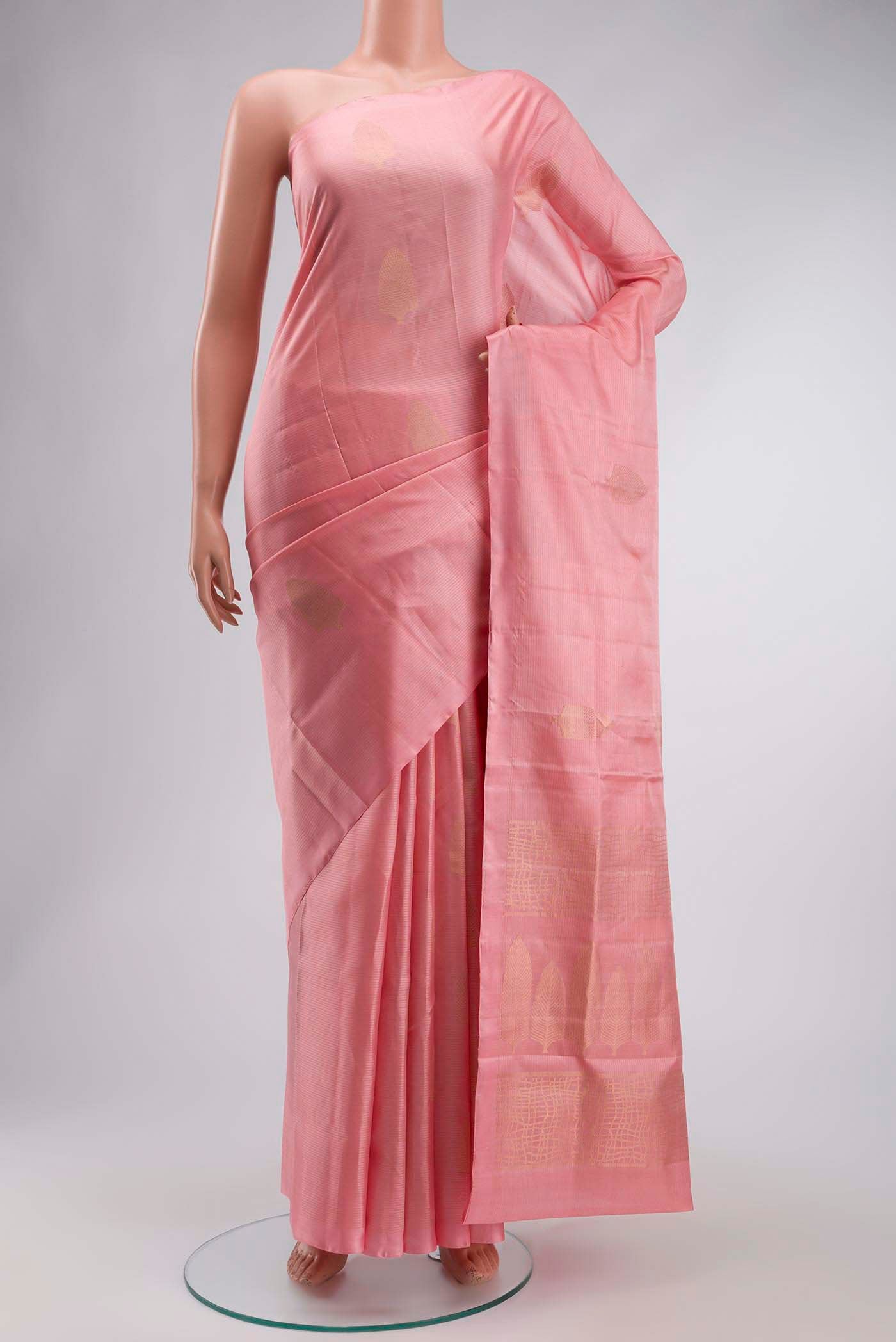 Rose pink Soft Silk Saree with Zari Butta on the body and Without Border displayed on a mannequin