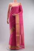 Pink Soft Silk Saree with Zari Butta on the body and Zari Border displayed on a mannequin