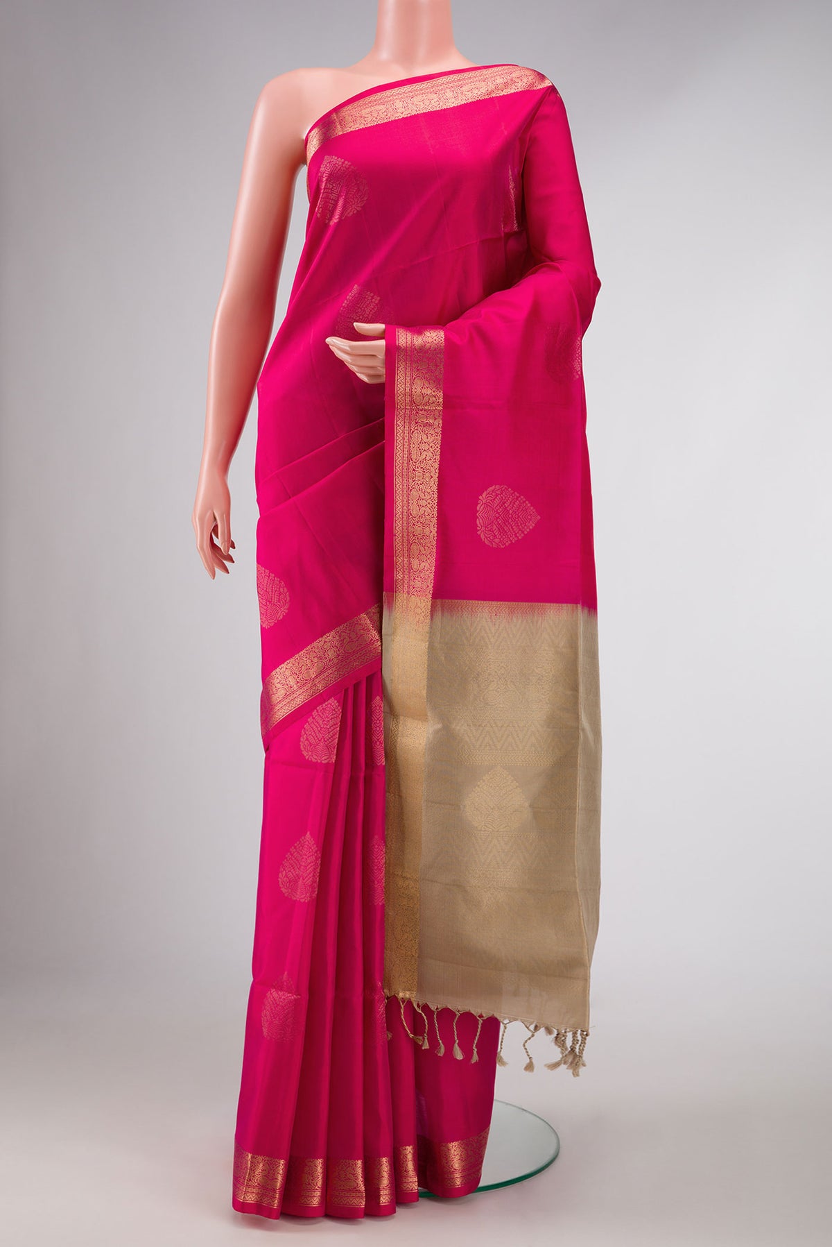 Dark Pink Dual Tone Soft Silk Saree with Zari Butta on the body and Zari Border displayed on a mannequin