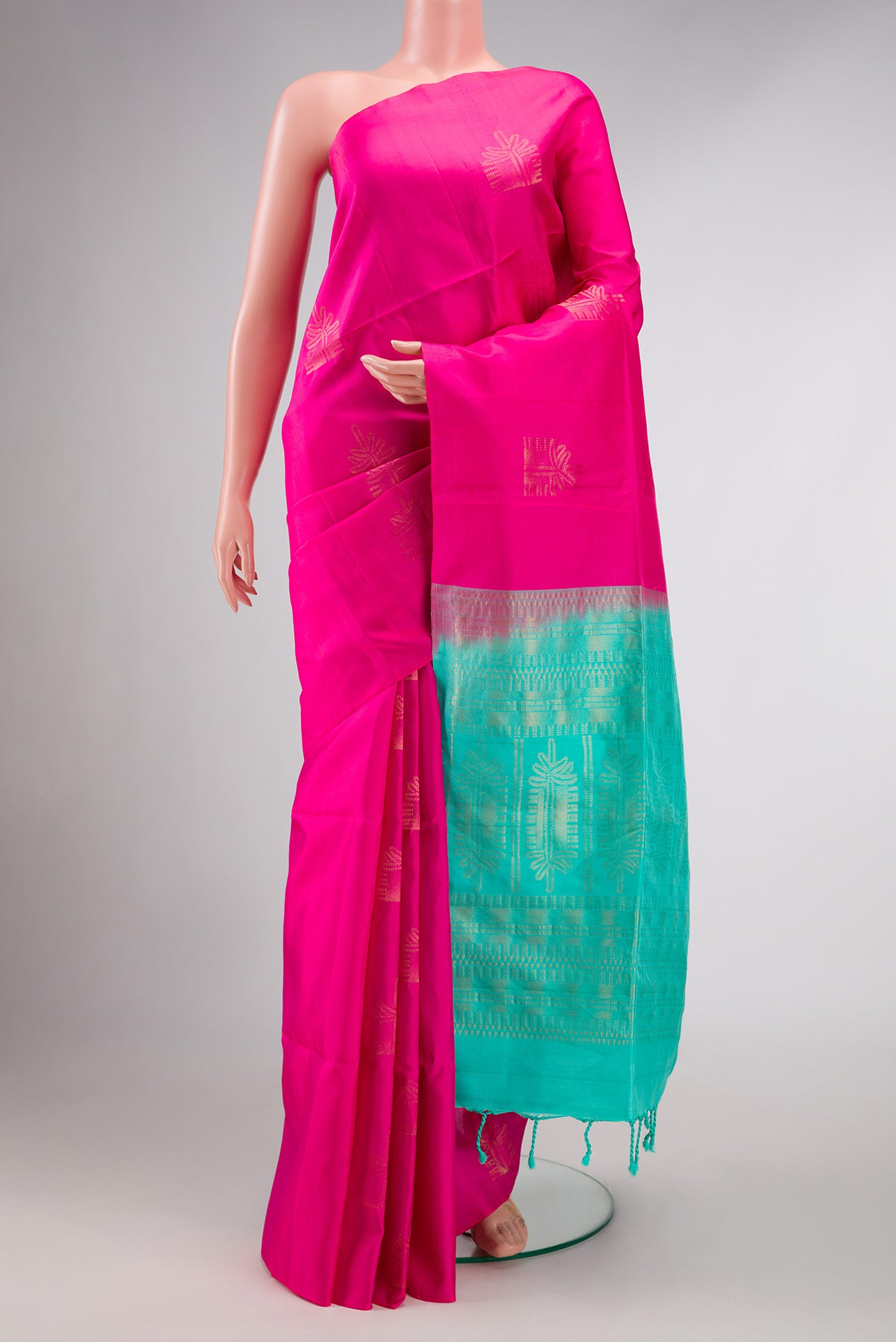 Pink Dual Tone Soft Silk Saree with Zari Butta on the body and Without Border displayed on a mannequin