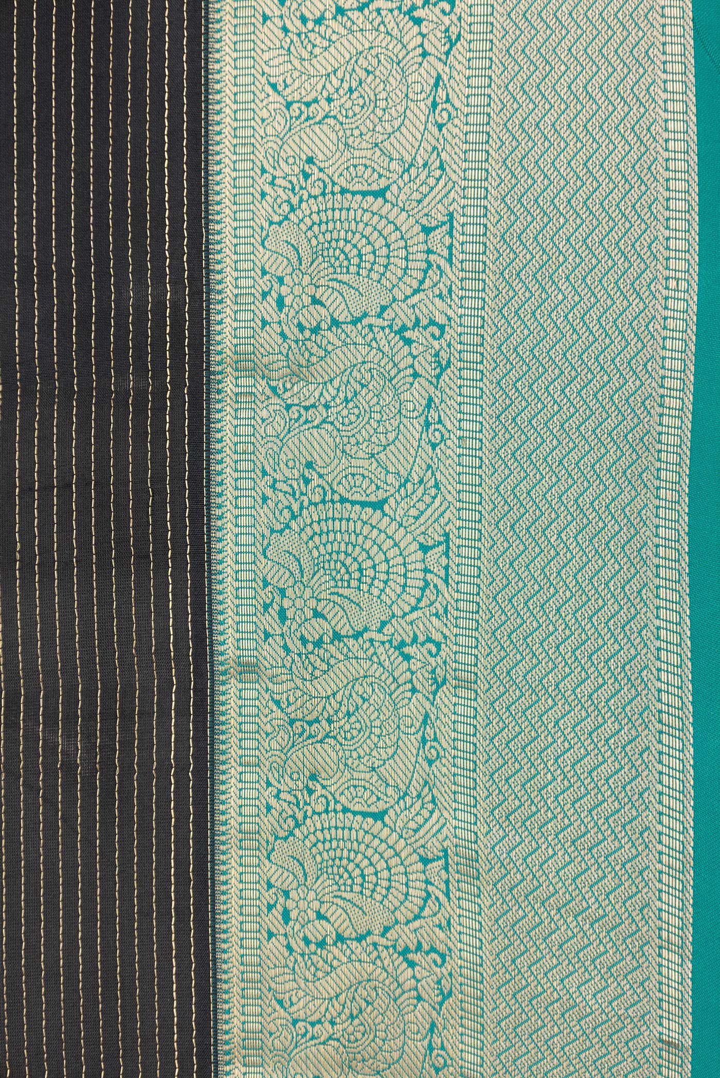 Border image of Black Dual Tone Kanchipuram Silk Saree with Stripes on the body and Zari Border. 