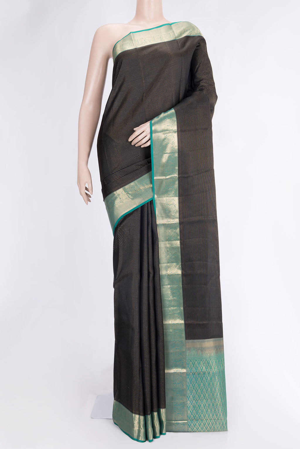 Black Dual Tone Kanchipuram Silk Saree with Stripes on the body and Zari Border.  displayed on a mannequin
