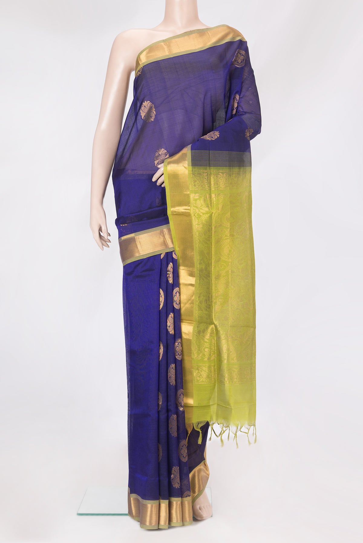 Dark Blue Silk Cotton Saree with Zari Butta on the body and Zari Border.  displayed on a mannequin