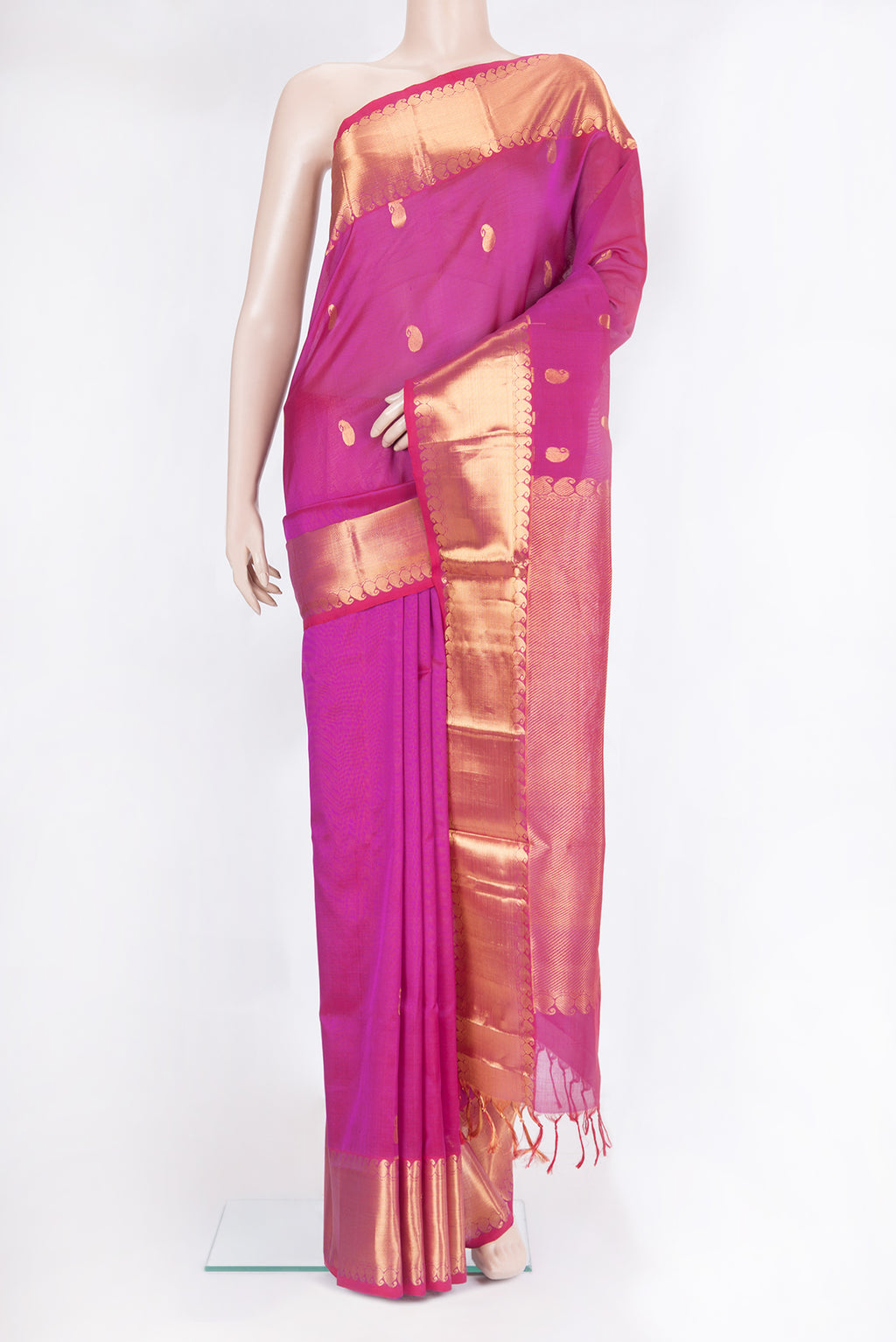 Dark Pink Silk Cotton Saree with Zari Butta on the body and Zari Border.  displayed on a mannequin