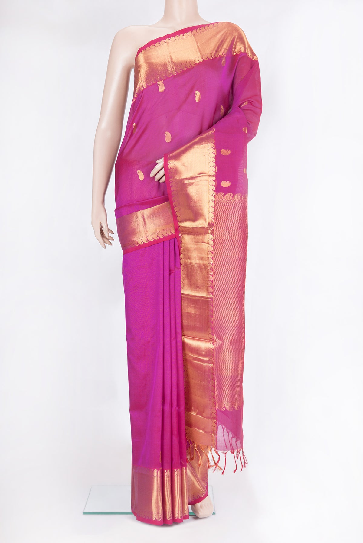 Dark Pink Silk Cotton Saree with Zari Butta on the body and Zari Border.  displayed on a mannequin