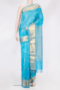 Sky Blue Silk Cotton Saree with Zari Butta on the body and Zari Border.  displayed on a mannequin