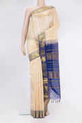 Beige Silk Cotton Saree with Jacquard design on the body and Zari Border.  displayed on a mannequin