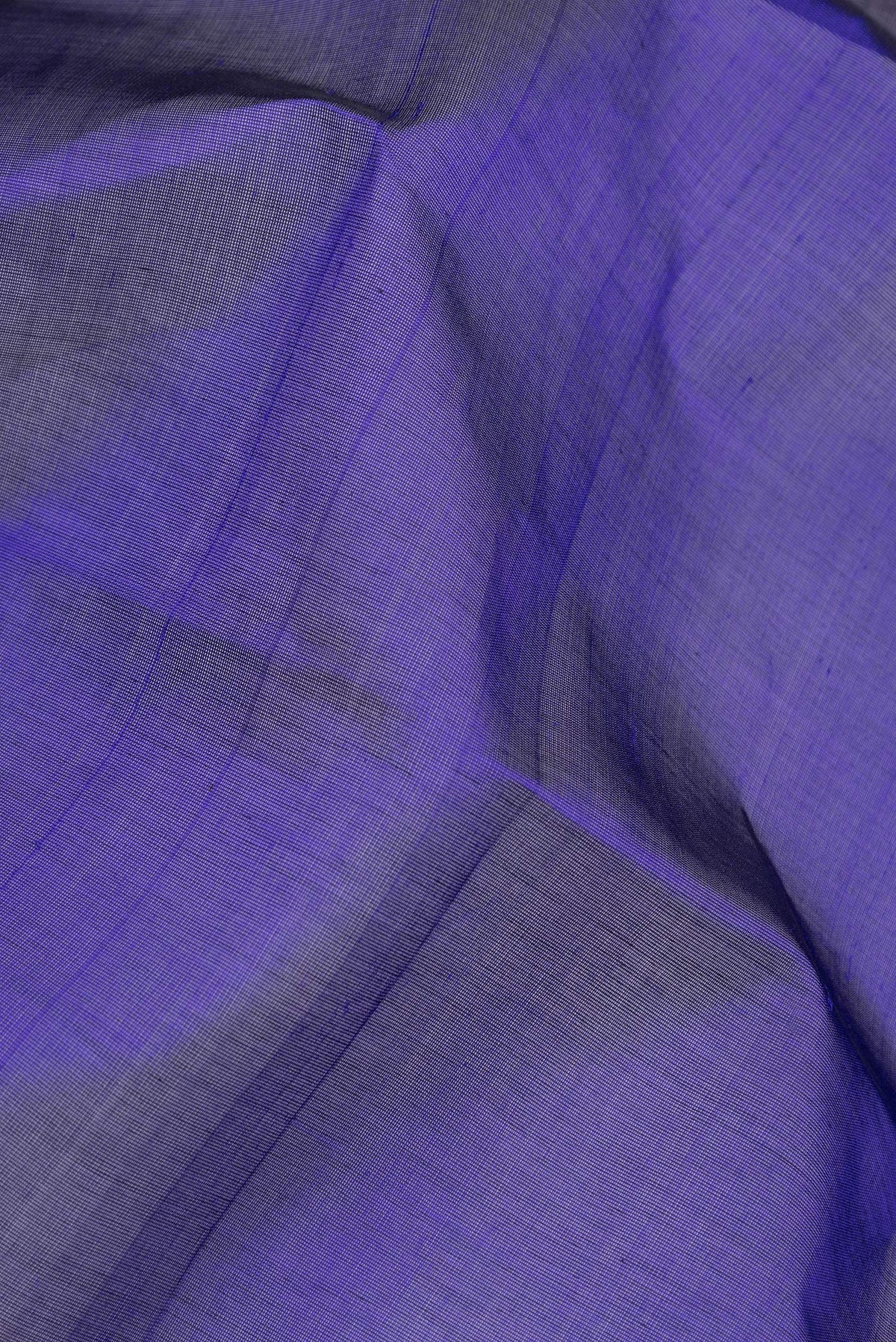 Close up of Royal Blue Silk Cotton Saree with Plain Body and Zari Border.  displaying folds