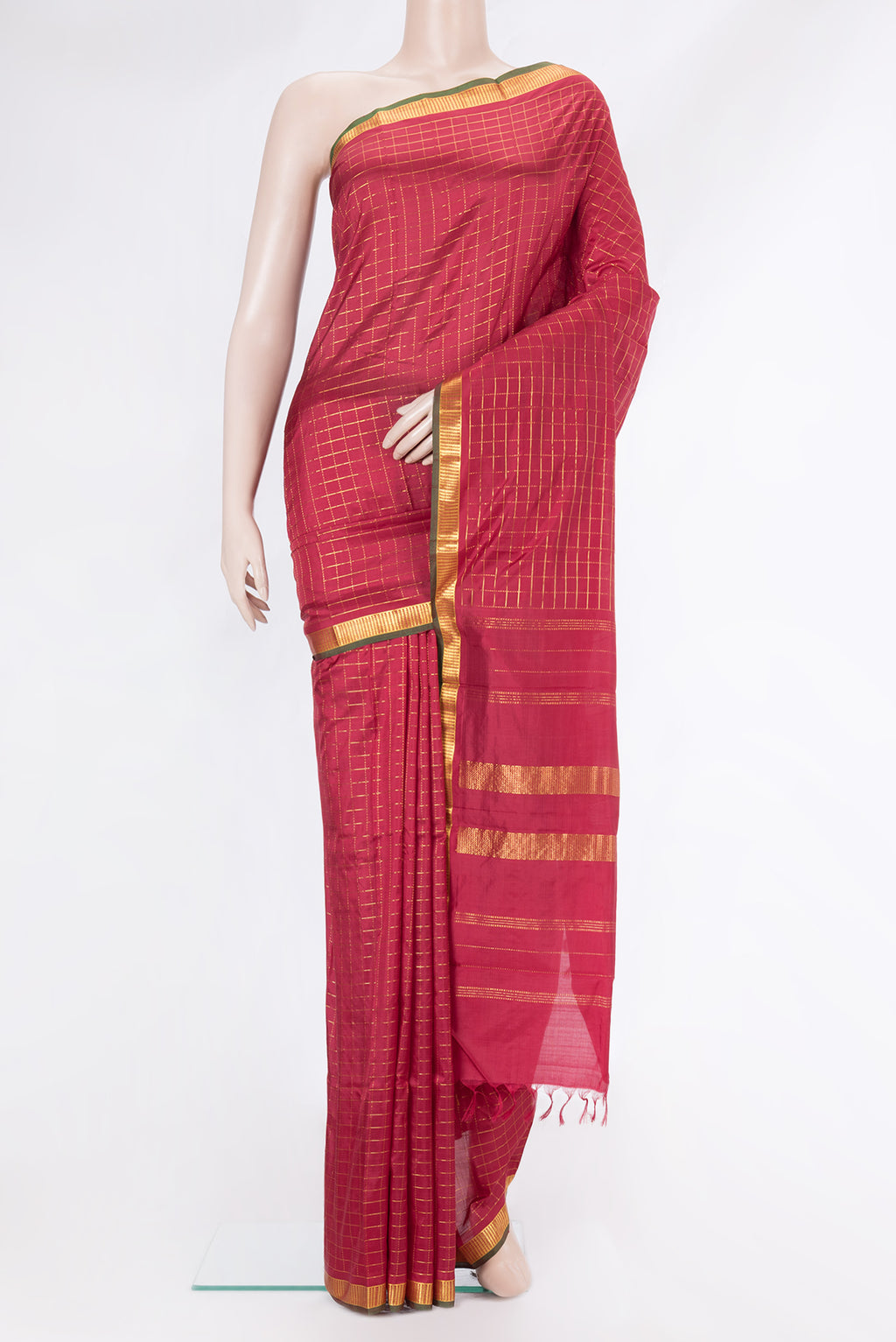 Maroon Kanchipuram Silk Saree with Checked design on the body and Zari Border.  displayed on a mannequin