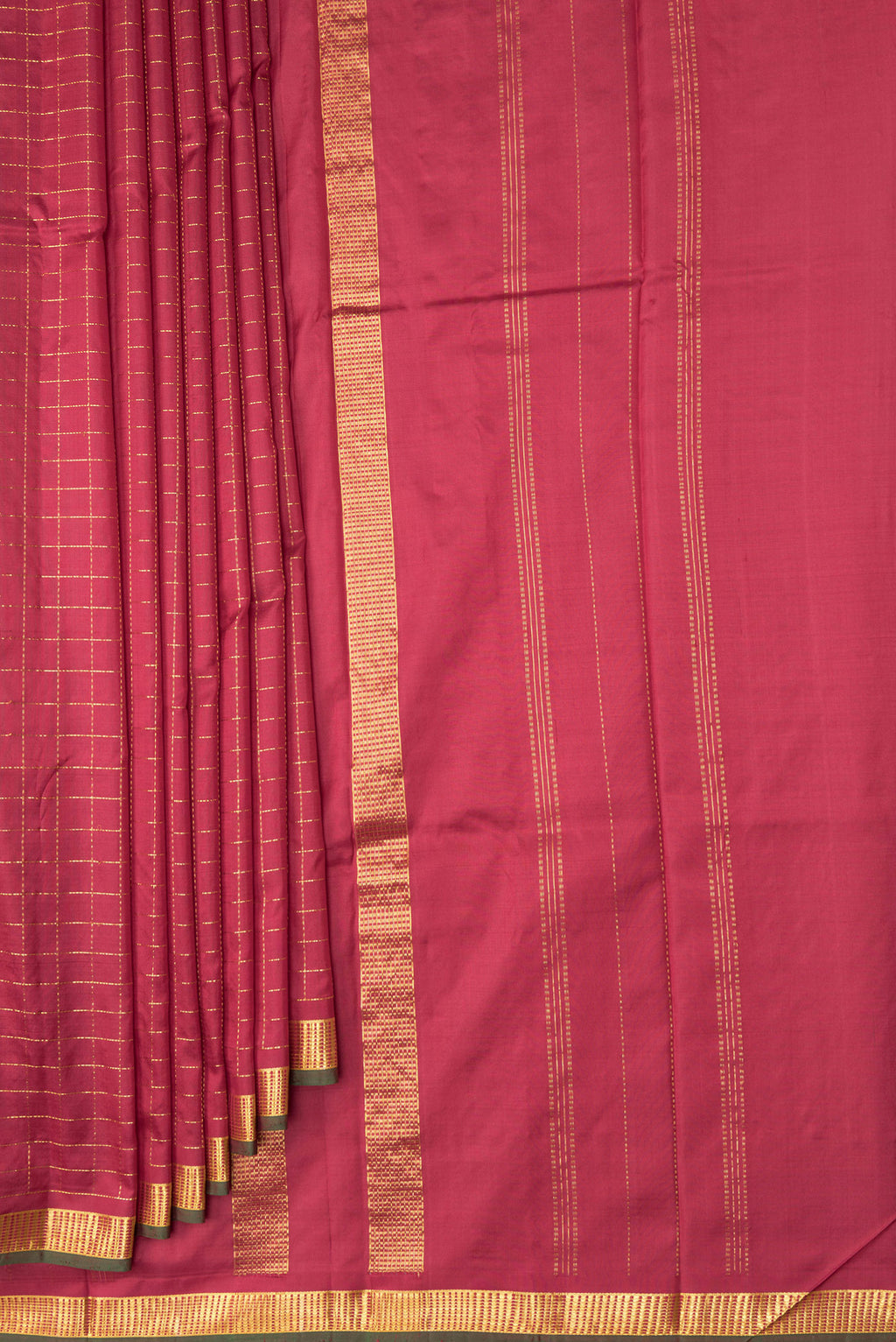 Pleats and pallu of Maroon Kanchipuram Silk Saree with Checked design on the body and Zari Border. 