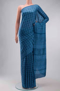 Blue Printed Silk Saree with Printed design on the body and Plain Border displayed on a mannequin