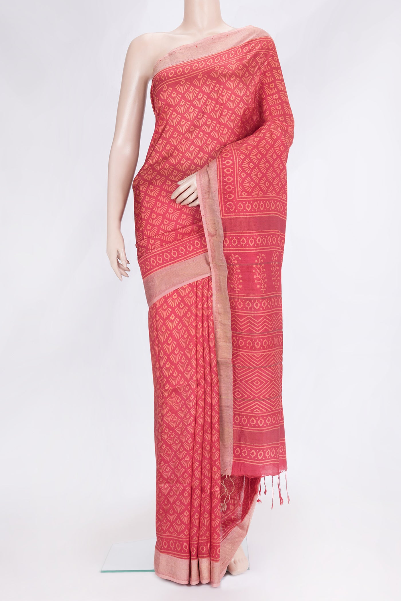 Red Dual Tone Printed Silk Saree with Printed design on the body and Printed Border.  displayed on a mannequin
