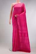 Pink Printed Silk Saree with Printed design on the body and Printed Border.  displayed on a mannequin