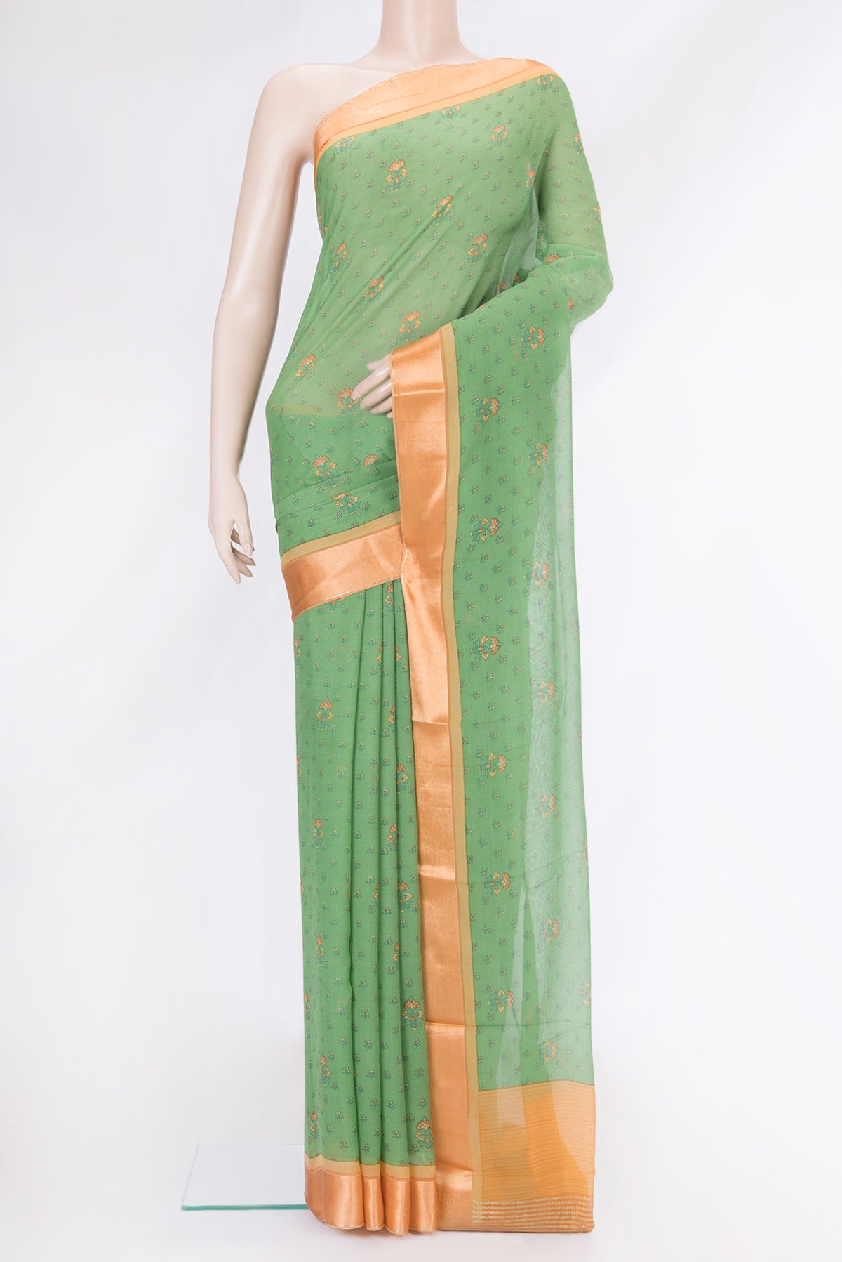 Green Dual Tone Mysore Chiffon Saree with Printed design on the body and Zari Border.  displayed on a mannequin