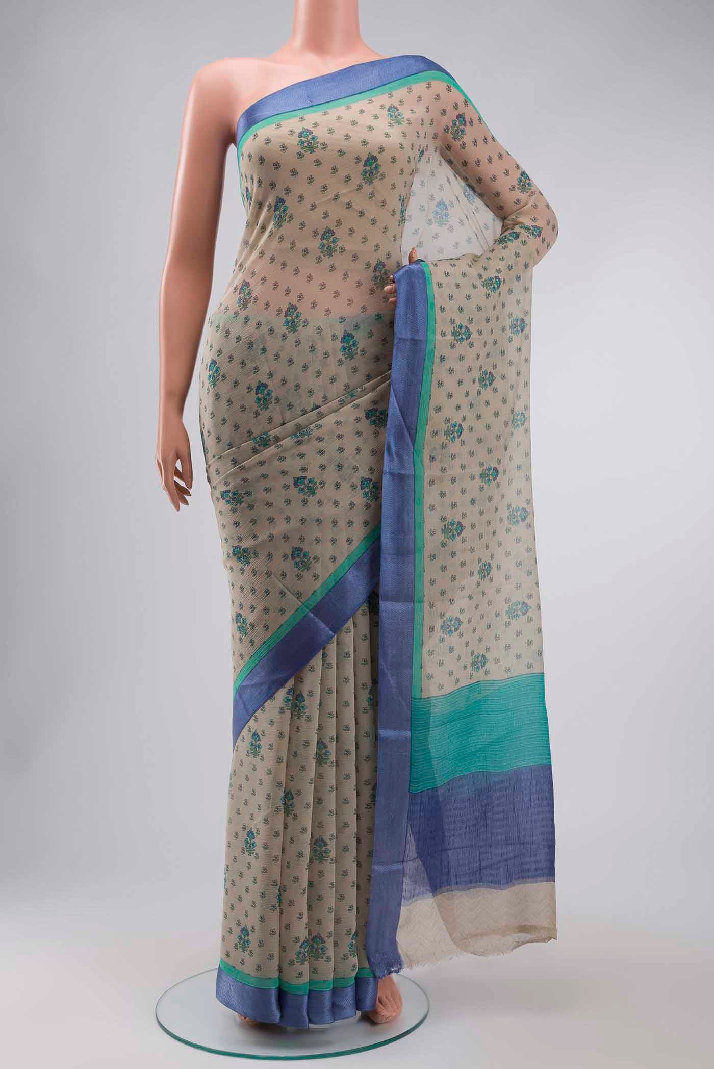 Grey Mysore Chiffon Saree with Printed design on the body and Thread Border displayed on a mannequin