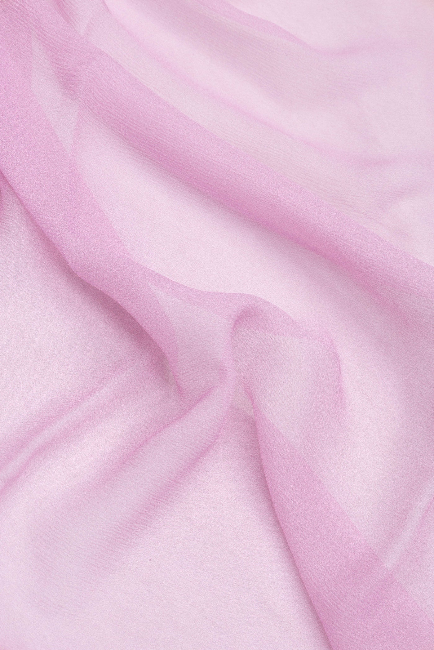 Close up of Pink Dual Tone Mysore Chiffon Saree with Printed design on the body and Printed Border.  displaying folds