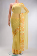 Yellow Mysore Chiffon Saree with Plain Body and Printed Border displayed on a mannequin