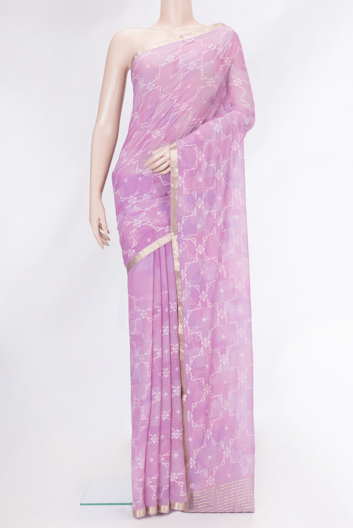 Lavender Dual Tone Chiffon Saree with Embroidery on the body and Zari Border.  displayed on a mannequin