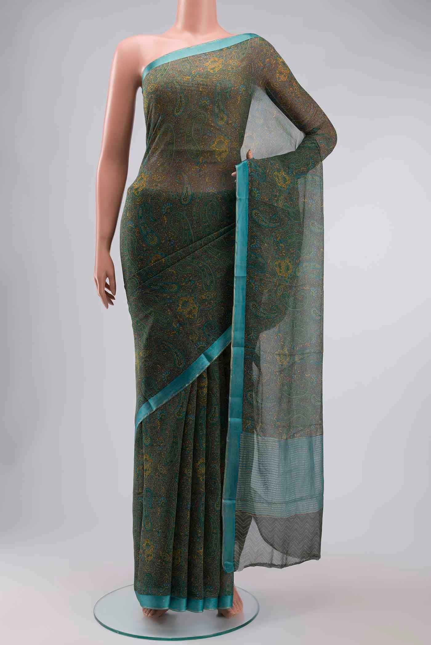 Green Mysore Chiffon Saree with Printed design on the body and Plain Border displayed on a mannequin