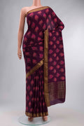 Purple Mysore Crepe Saree with Printed design on the body and Zari Border displayed on a mannequin