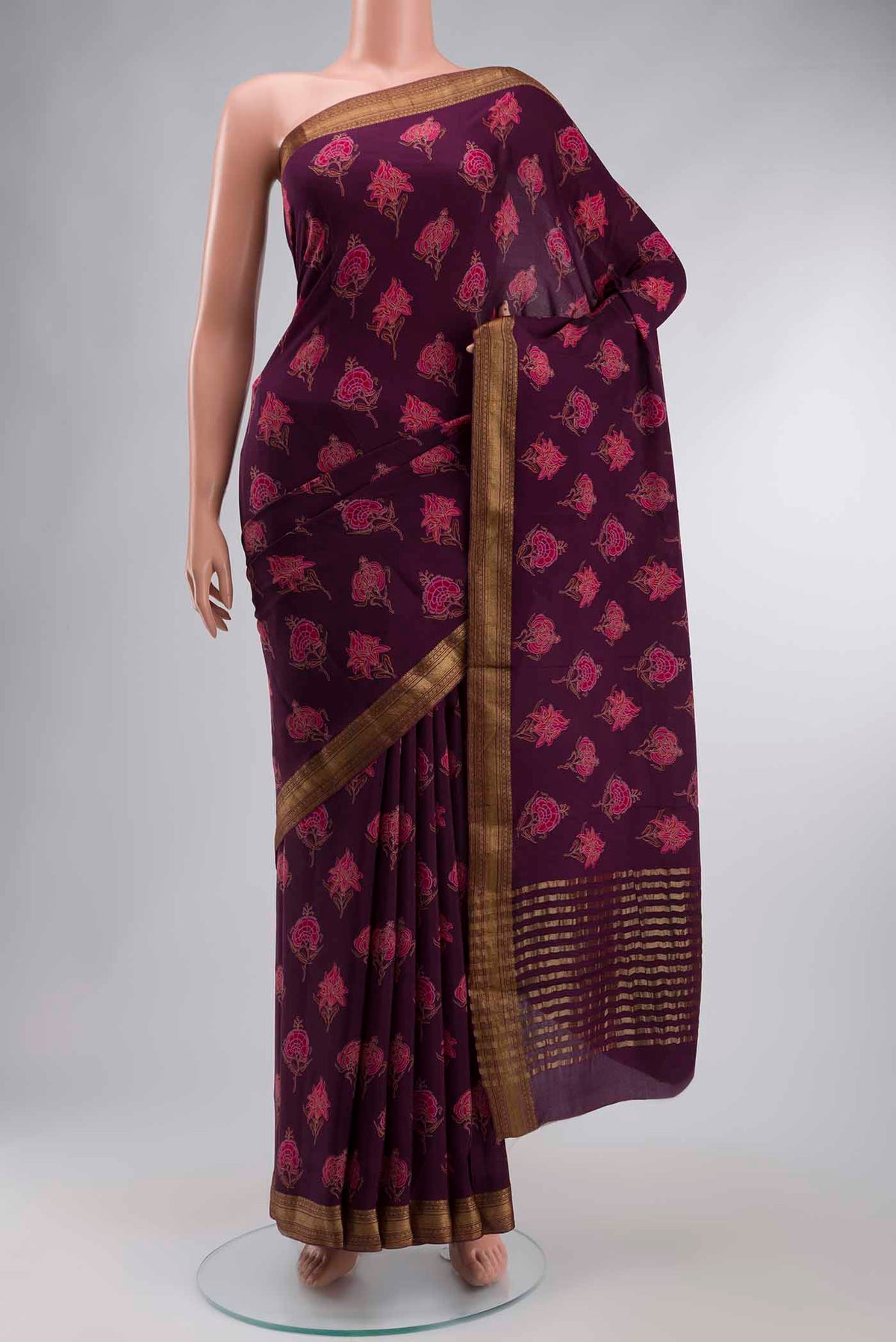 Purple Mysore Crepe Saree with Printed design on the body and Zari Border displayed on a mannequin