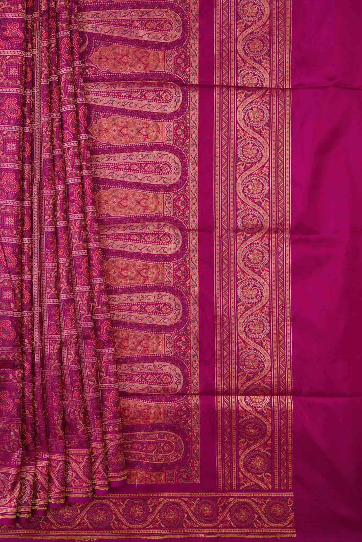 Pleats and pallu of Magenta Banarasi Silk Saree with Checked design on the body and Zari Border
