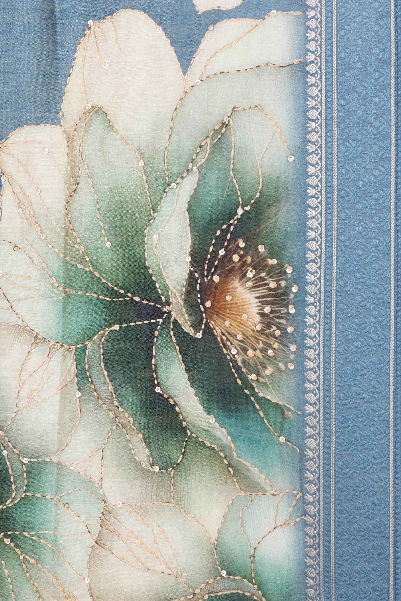 Border image of Light Blue Dual Tone Tussar Silk Saree with Embroidery on the body and Zari And Thread Border. 