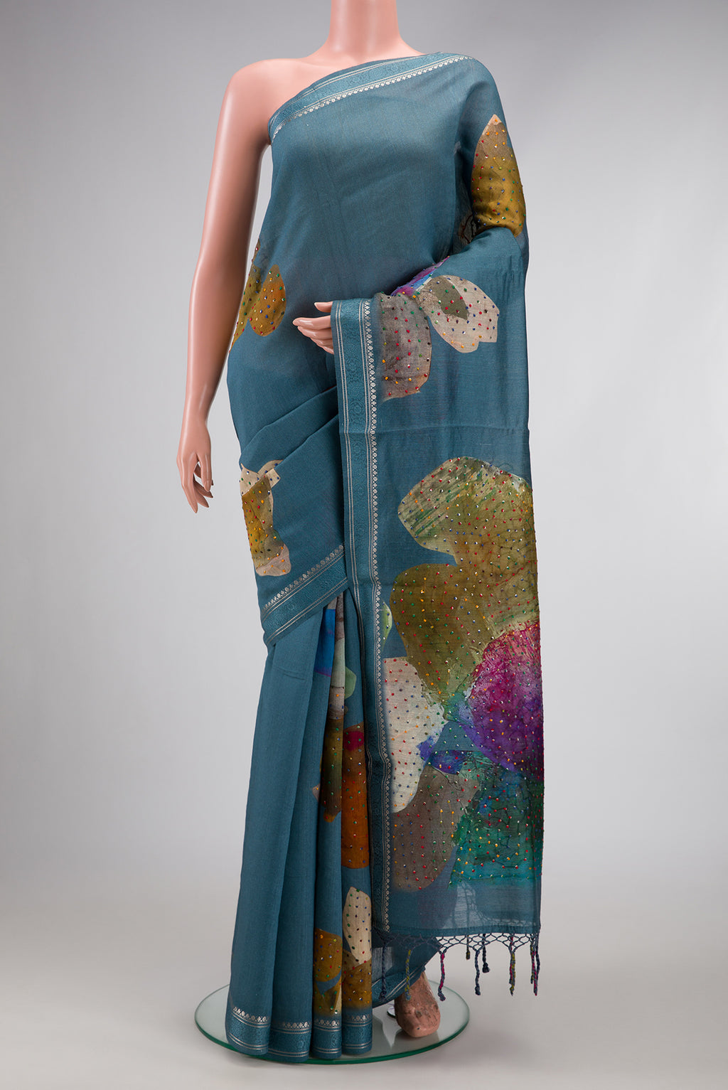 Blue Grey Dual Tone Tussar Silk Saree with Embroidery on the body and Zari And Thread Border.  displayed on a mannequin