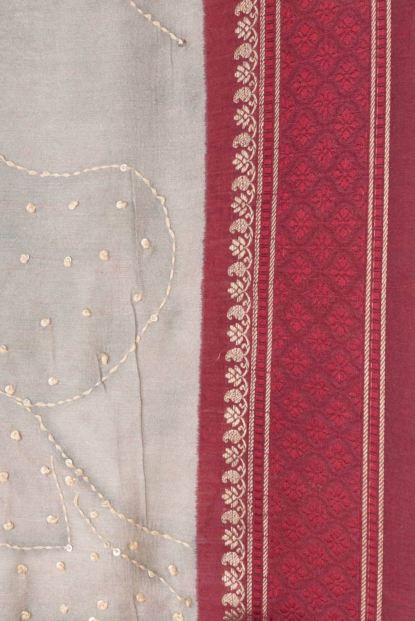 Border image of Grey Dual Tone Tussar Silk Saree with Embroidery on the body and Zari And Thread Border. 