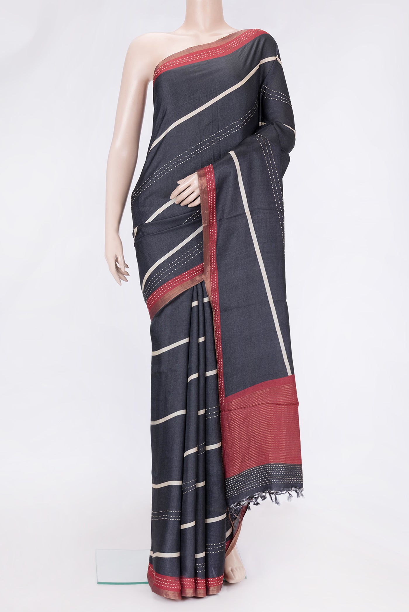 Black Dual Tone Tussar Silk Saree with Embroidery on the body and Embroidery Border.  displayed on a mannequin