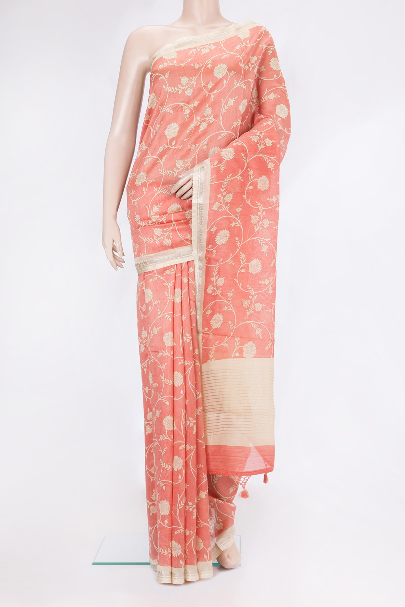 Peach Dual Tone Chanderi Silk Saree with Printed design on the body and Zari And Thread Border.  displayed on a mannequin