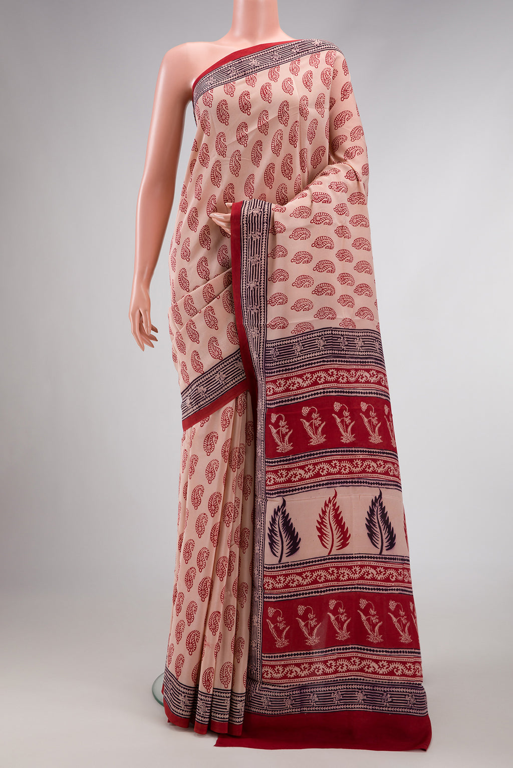 Rose Gold Dual Tone Mysore Crepe Saree with Printed design on the body and Printed Border.  displayed on a mannequin