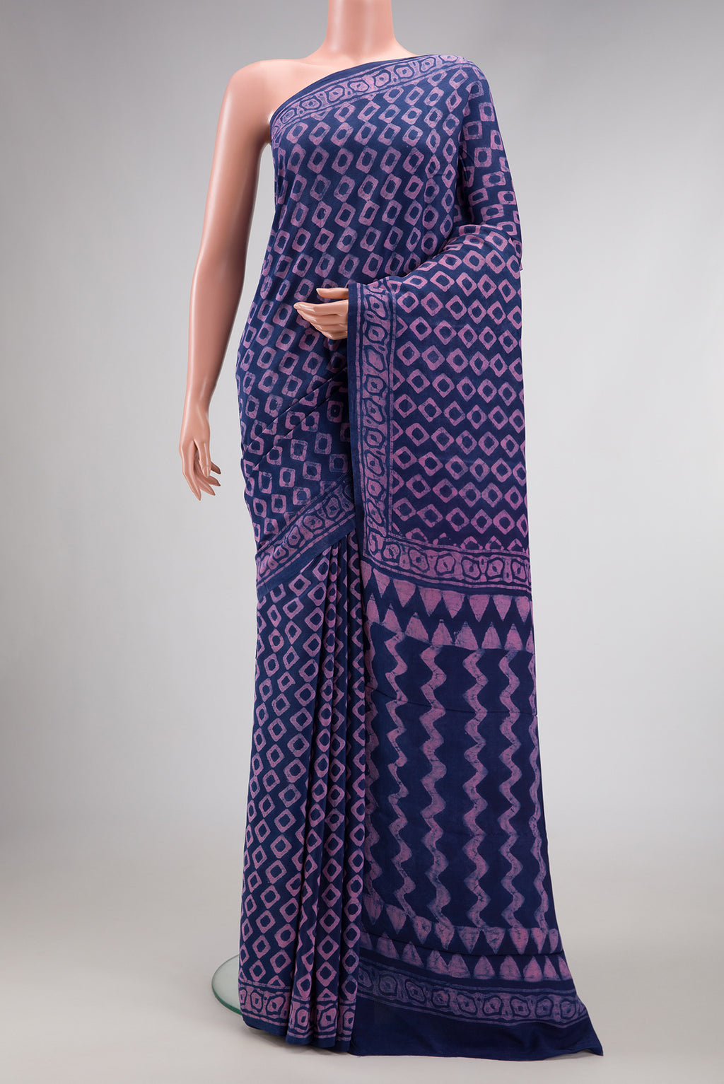 Royal Blue Dual Tone Mysore Crepe Saree with Printed design on the body and Printed Border.  displayed on a mannequin