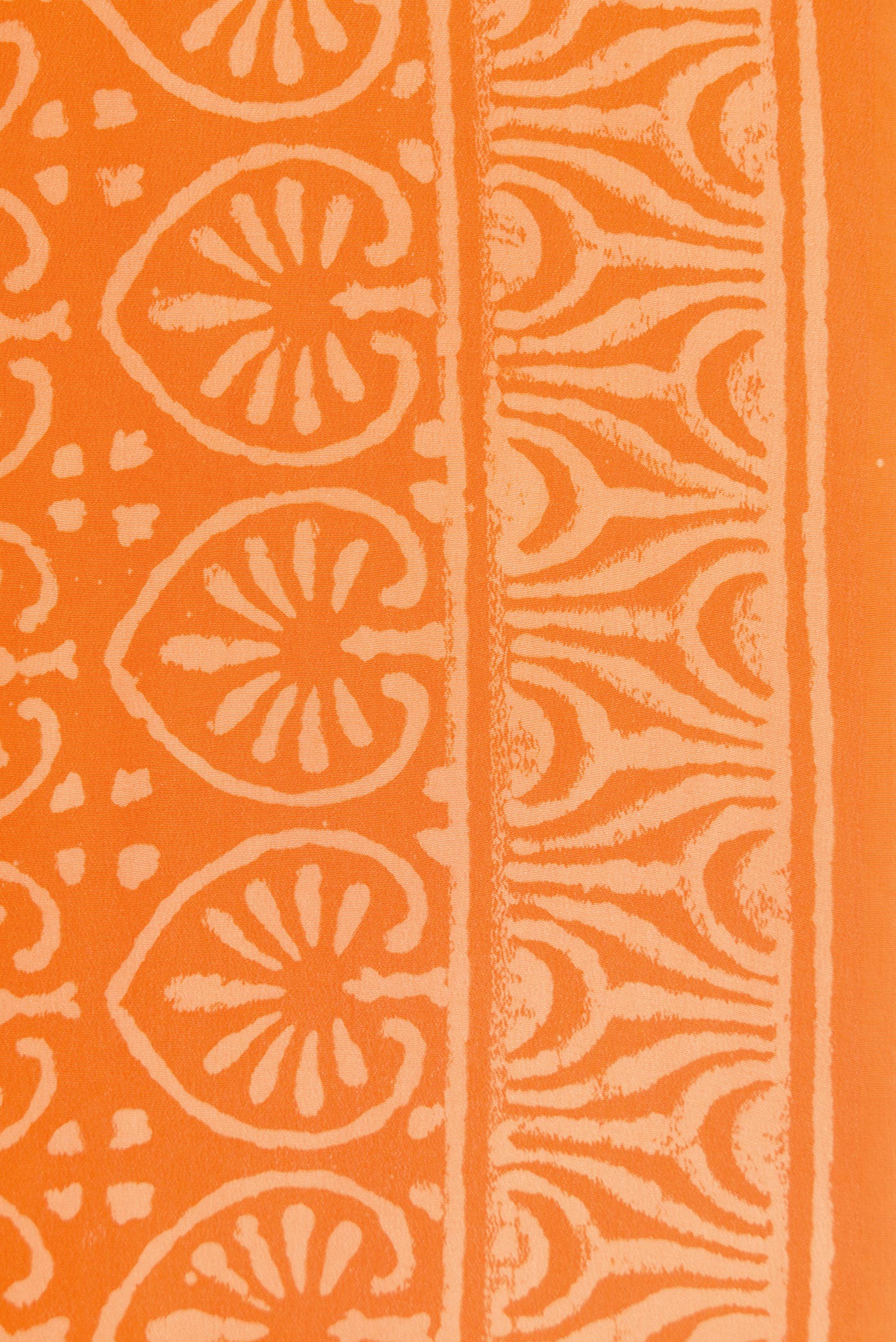 Border image of Orange Dual Tone Mysore Crepe Saree with Printed design on the body and Printed Border. 
